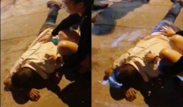 Clip hiện trường tài xế taxi bị bắn súng đạn cao su vào bụng, cán ô tô qua người